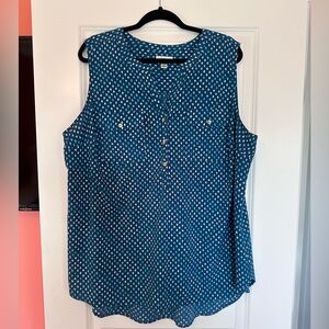 Sleeveless top with gold buttons in green with teal design